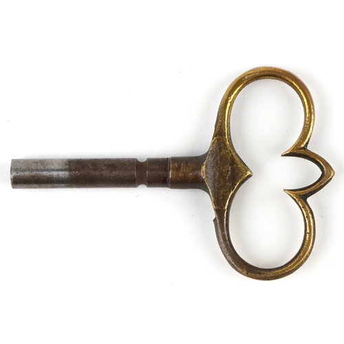  Antique French brass mantle clock cast with lion heads and Putto, striking on a gong, the enamelled ... 