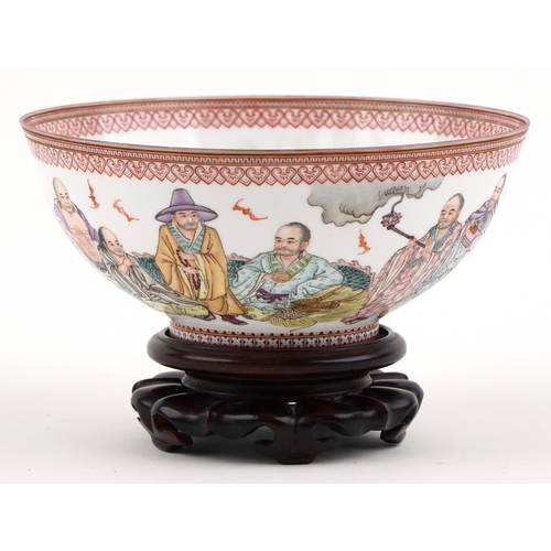  Chinese porcelain footed bowl hand painted in the famille rose palette with an emperor and attendant... 