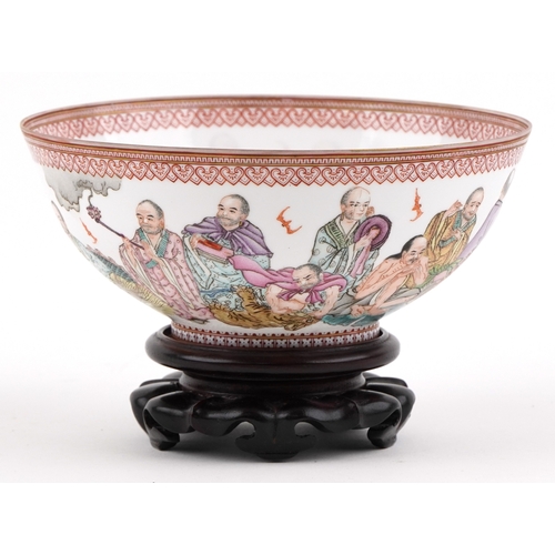  Chinese porcelain footed bowl hand painted in the famille rose palette with an emperor and attendant... 
