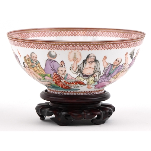  Chinese porcelain footed bowl hand painted in the famille rose palette with an emperor and attendant... 