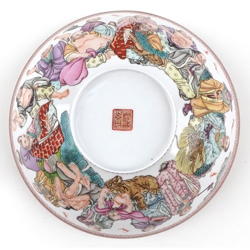  Chinese porcelain footed bowl hand painted in the famille rose palette with an emperor and attendant... 