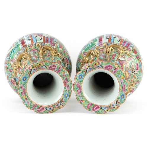  Pair of Chinese Canton porcelain vases hand painted in the famille rose palette with an emperor and ... 