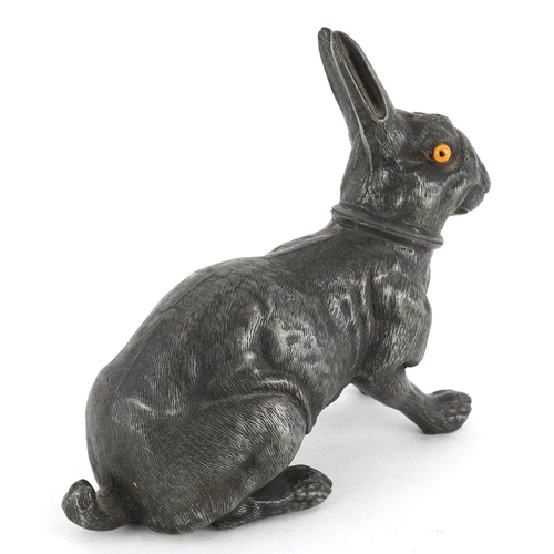  Antique pewter pounce pot in the form of a hare with glass eyes, 12cm wide.