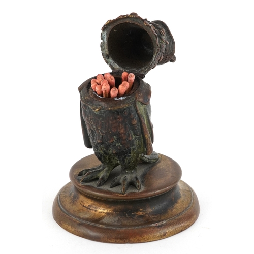  Early 20th century bronze inkwell in the form of an owl, raised on a brass plinth base, 12cm high.