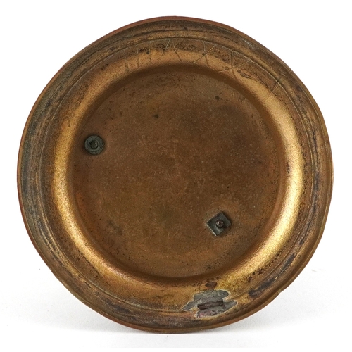  Early 20th century bronze inkwell in the form of an owl, raised on a brass plinth base, 12cm high.