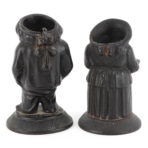 44 - Two 19th century E G Zimmerman cast iron figural match holders, the largest 9cm high.