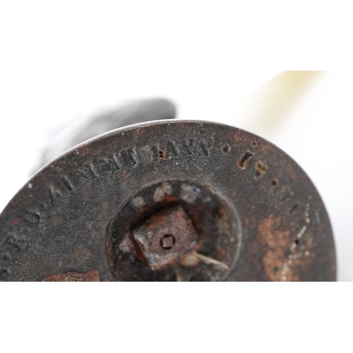 44 - Two 19th century E G Zimmerman cast iron figural match holders, the largest 9cm high.