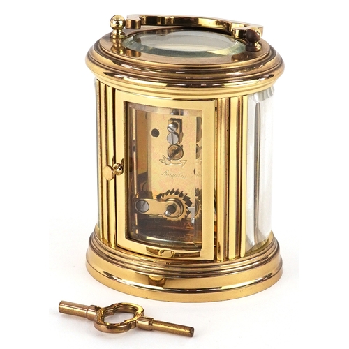 20th century French gilt brass carriage clock, the white enamel dial having black Roman numerals, de... 