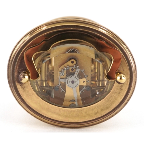  20th century French gilt brass carriage clock, the white enamel dial having black Roman numerals, de... 