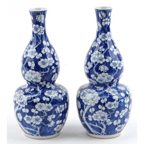  Pair of Chinese demi gourd blue and white vases hand painted in the prunus pattern, character marks ... 