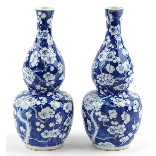  Pair of Chinese demi gourd blue and white vases hand painted in the prunus pattern, character marks ... 