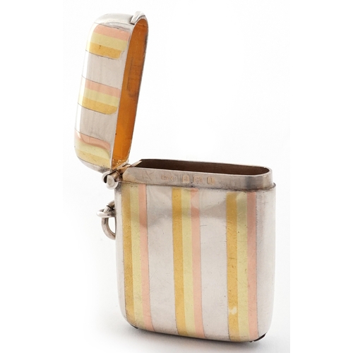  William Hair Haseler, Edwardian silver and gilt vesta case, Birmingham 1910, 4.9cm high, 29.2g.