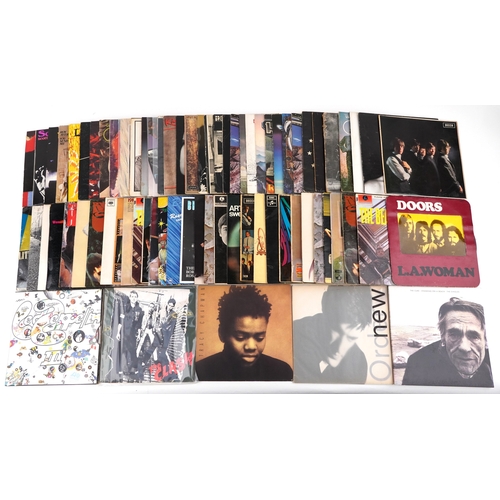 Collection of vinyl LP records including The Clash, Tracy Chapman, Led ...