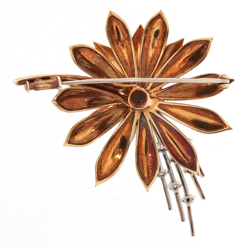  14ct two tone gold flower head brooch set with nine diamond solitaires, 5cm wide, 16.0g.