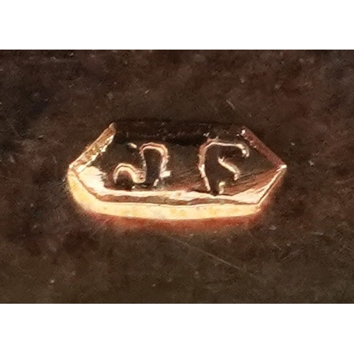  9ct gold mounted cameo shell brooch carved with flowers, 4.5cm in diameter, 12.2g.