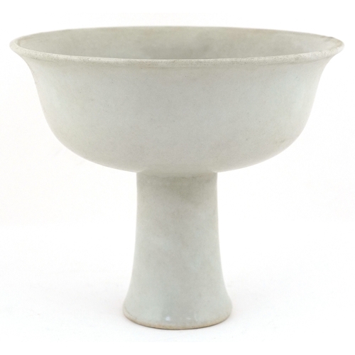 59 - Chinese cream porcelain glazed stem bowl, the interior relief decorated with flowers and foliage, 11... 