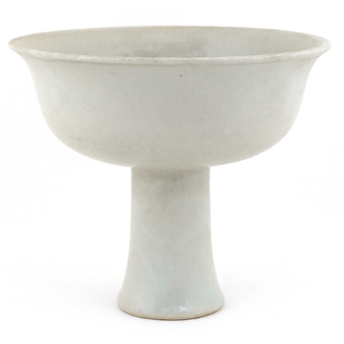 59 - Chinese cream porcelain glazed stem bowl, the interior relief decorated with flowers and foliage, 11... 