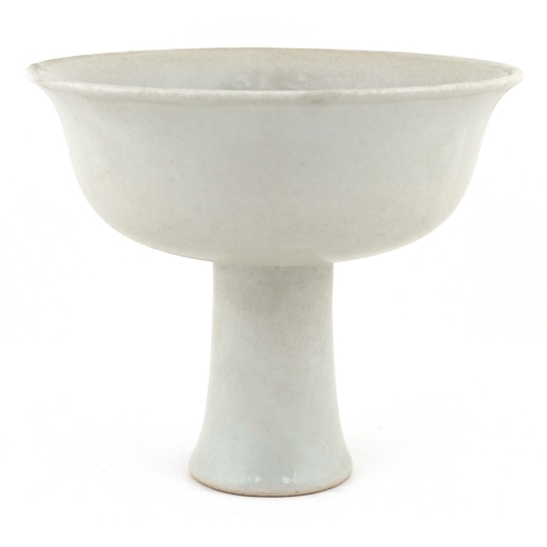 59 - Chinese cream porcelain glazed stem bowl, the interior relief decorated with flowers and foliage, 11... 