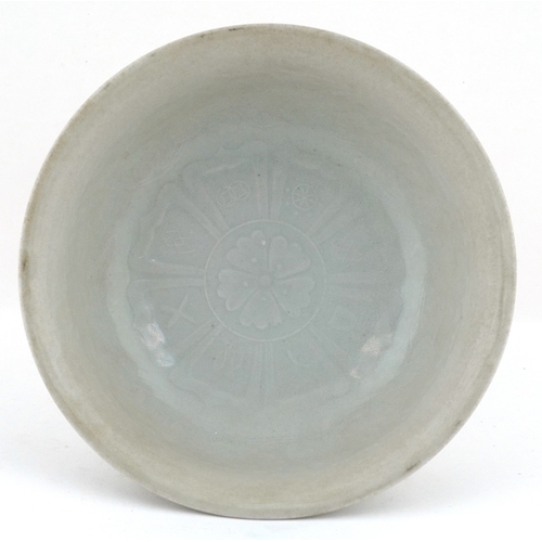 59 - Chinese cream porcelain glazed stem bowl, the interior relief decorated with flowers and foliage, 11... 