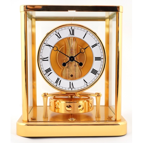 23 - Jaeger LeCoultre brass cased Atmos clock numbered 702280, 22.5cm high.
