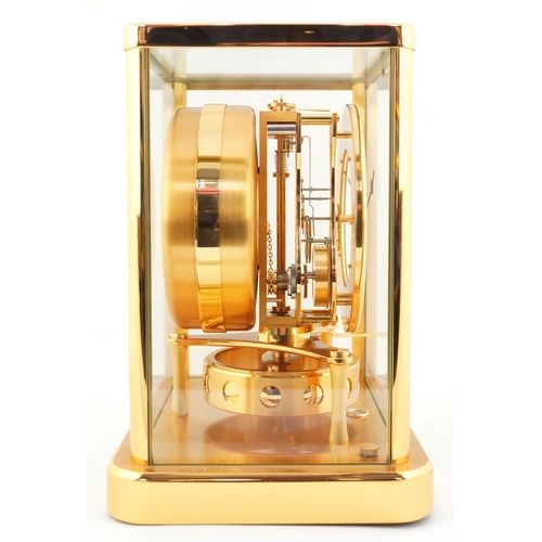 23 - Jaeger LeCoultre brass cased Atmos clock numbered 702280, 22.5cm high.