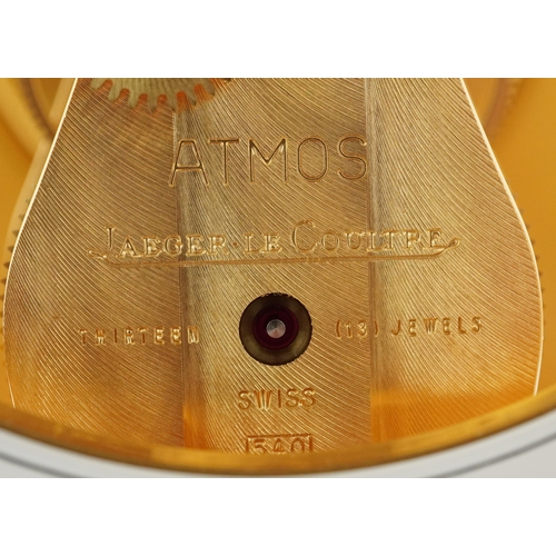 23 - Jaeger LeCoultre brass cased Atmos clock numbered 702280, 22.5cm high.