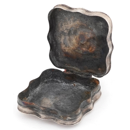 550 - Continental silver box with engine turned and engraved floral decoration, 4.8cm wide, 29.3g.