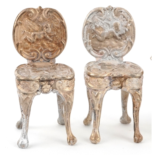 547 - A Chick & Sons Ltd., set of Elizabeth II silver doll's house furniture comprising a table, sofa and ... 