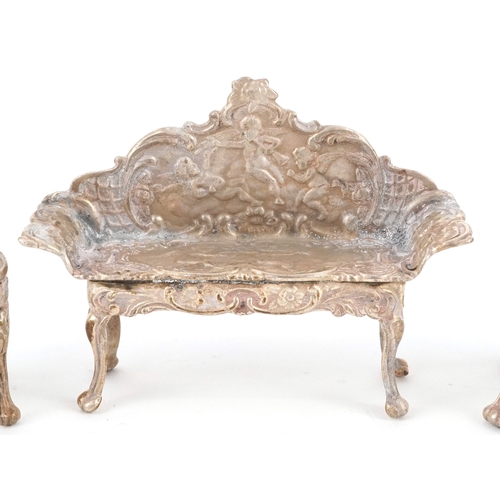 547 - A Chick & Sons Ltd., set of Elizabeth II silver doll's house furniture comprising a table, sofa and ... 