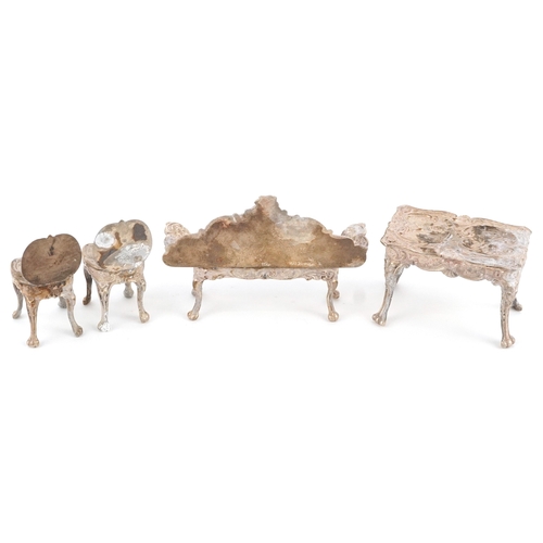 547 - A Chick & Sons Ltd., set of Elizabeth II silver doll's house furniture comprising a table, sofa and ... 