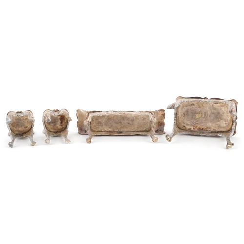 547 - A Chick & Sons Ltd., set of Elizabeth II silver doll's house furniture comprising a table, sofa and ... 