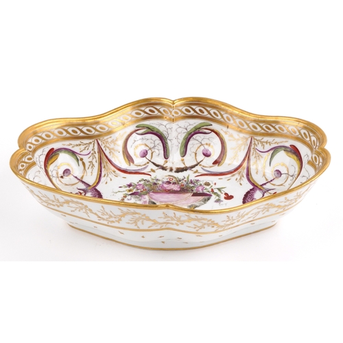 14 - 18th century French porcelain scalloped dish hand painted with a basket of flowers raised on an ostr... 
