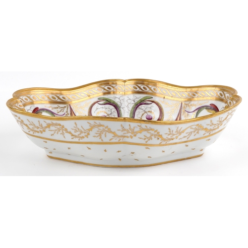 14 - 18th century French porcelain scalloped dish hand painted with a basket of flowers raised on an ostr... 