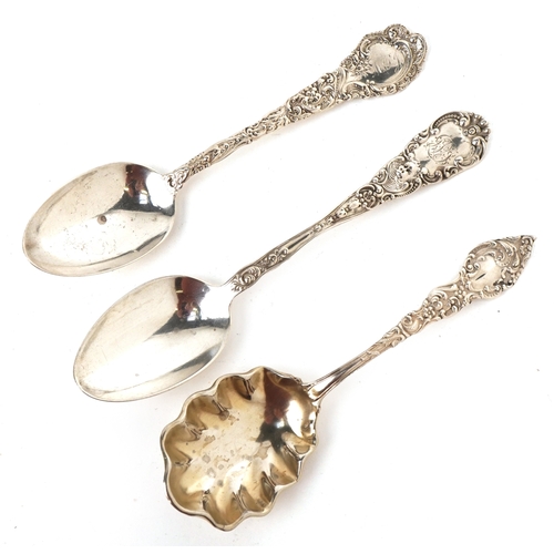 Three American sterling silver spoons, each with embossed floral ...