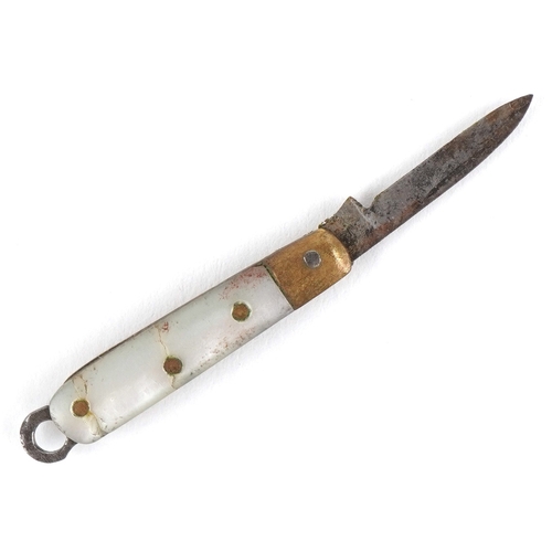 50 - Miniature mother of pearl flanked folding pocket knife, 2.9cm in length closed.