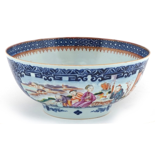 57 - Chinese porcelain fruit bowl hand painted in the famille rose palette with panels of figures before ... 