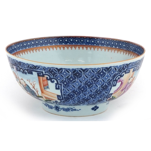 57 - Chinese porcelain fruit bowl hand painted in the famille rose palette with panels of figures before ... 