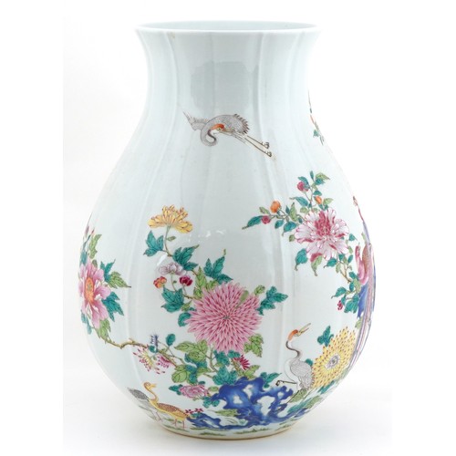  Large Chinese porcelain vase finely hand painted in the famille verte palette with birds of paradise... 