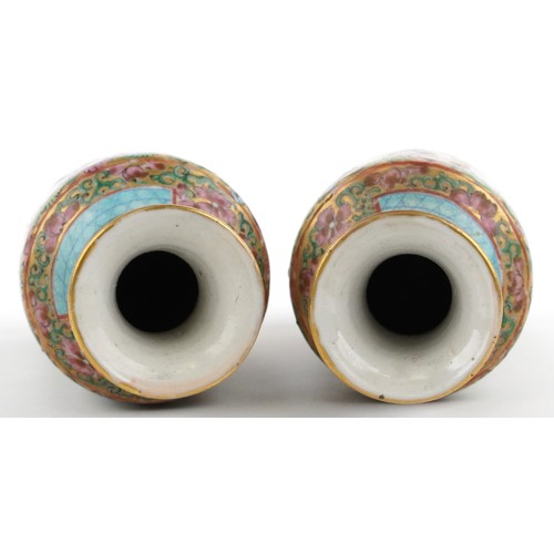 55 - Pair of Chinese Canton porcelain vases hand painted in the famille verte palette with figures in a p... 