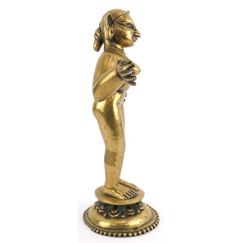 410 - Antique Indian heavy gilt bronze figure of Radha, approx 4.4kg, 30cm high.