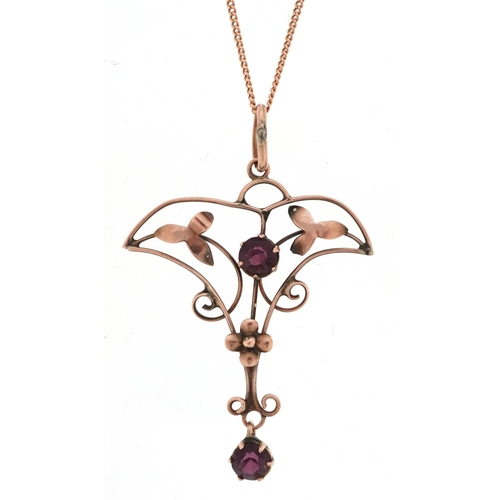 3050 - Edwardian 9ct gold purple stone openwork pendant on a gold necklace, the clasp marked 14ct gold, 4cm... 