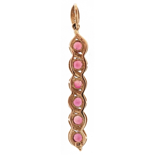 3032 - 9K gold pink spinel and diamond pendant, 4.4cm high, 1.9g.