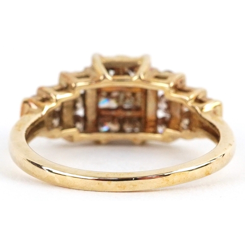 3057 - 9K gold diamond grid cluster ring with diamond set shoulders, size N, 2.9g.