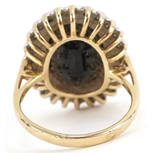 3043 - 9ct gold sapphire and diamond cluster ring, total diamond weight approximately 0.12 carat, the sapph... 
