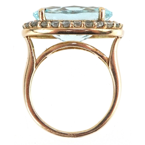 3035 - 9ct gold topaz and blue stone ring, the topaz approximately 10.30 carat, size L, 5.3g.