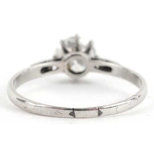 3007 - Platinum diamond solitaire ring with diamond set shoulders, the central diamond approximately 1.01 c... 