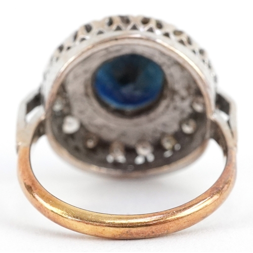  18ct yellow and white gold sapphire and diamond cluster ring, the sapphire approximately 3.16 carat,... 