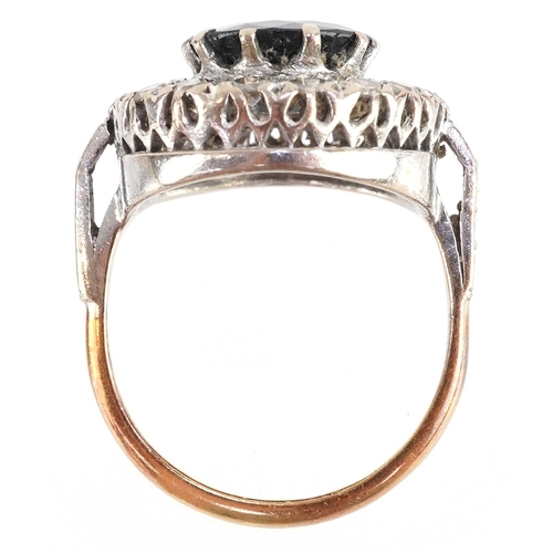  18ct yellow and white gold sapphire and diamond cluster ring, the sapphire approximately 3.16 carat,... 