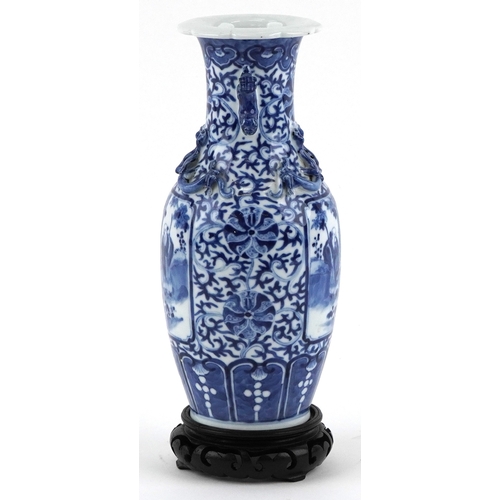 83 - Chinese blue and white porcelain baluster vase having twin chilong handles, hand painted with panels... 