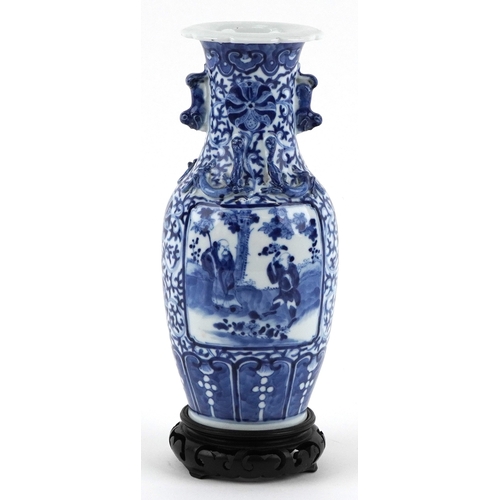 83 - Chinese blue and white porcelain baluster vase having twin chilong handles, hand painted with panels... 
